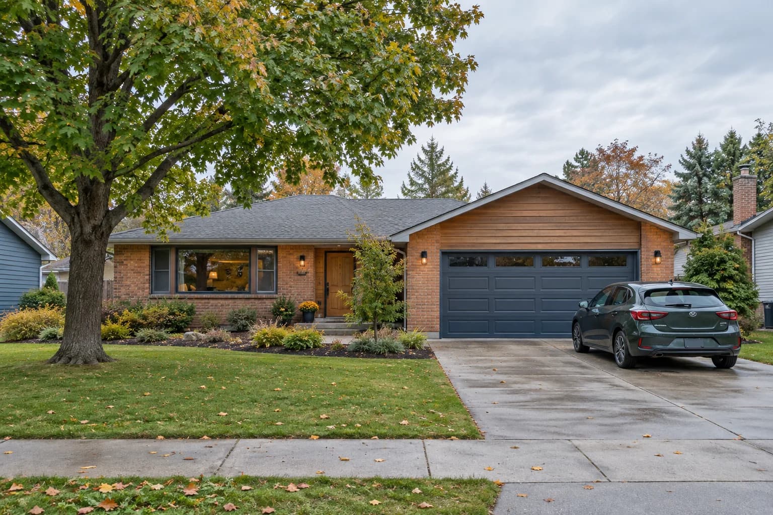 A brick and timber home with a green hatchback beside the garage